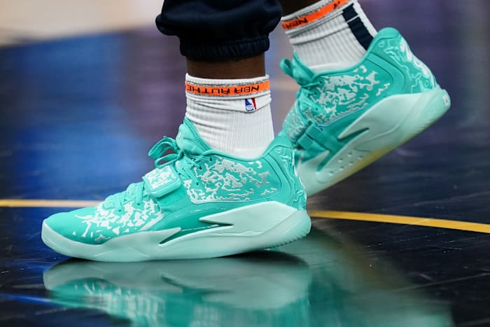 New Orleans Pelicans forward Zion Williamson's teal Jordan Brand sneakers.